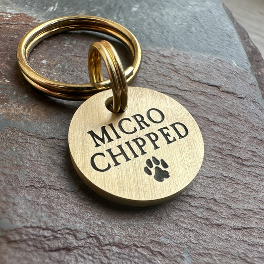 Microchipped - brass disc shape