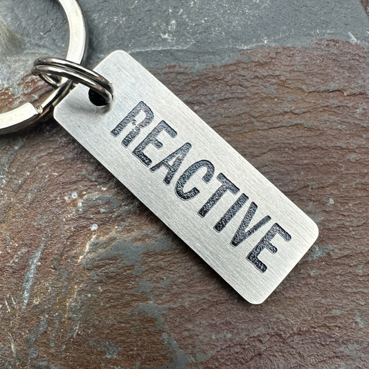Reactive - tab shape  - stainless steel